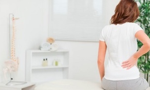 causas de dor nas costas em mulheres
